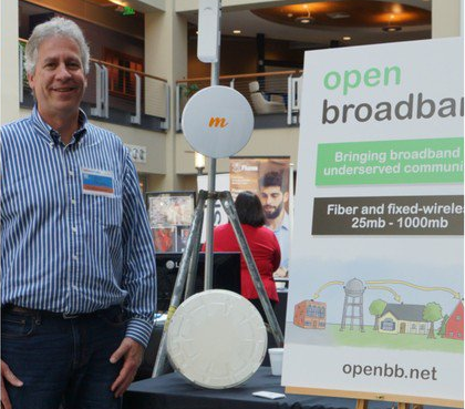 Alan with the Open broadband banner